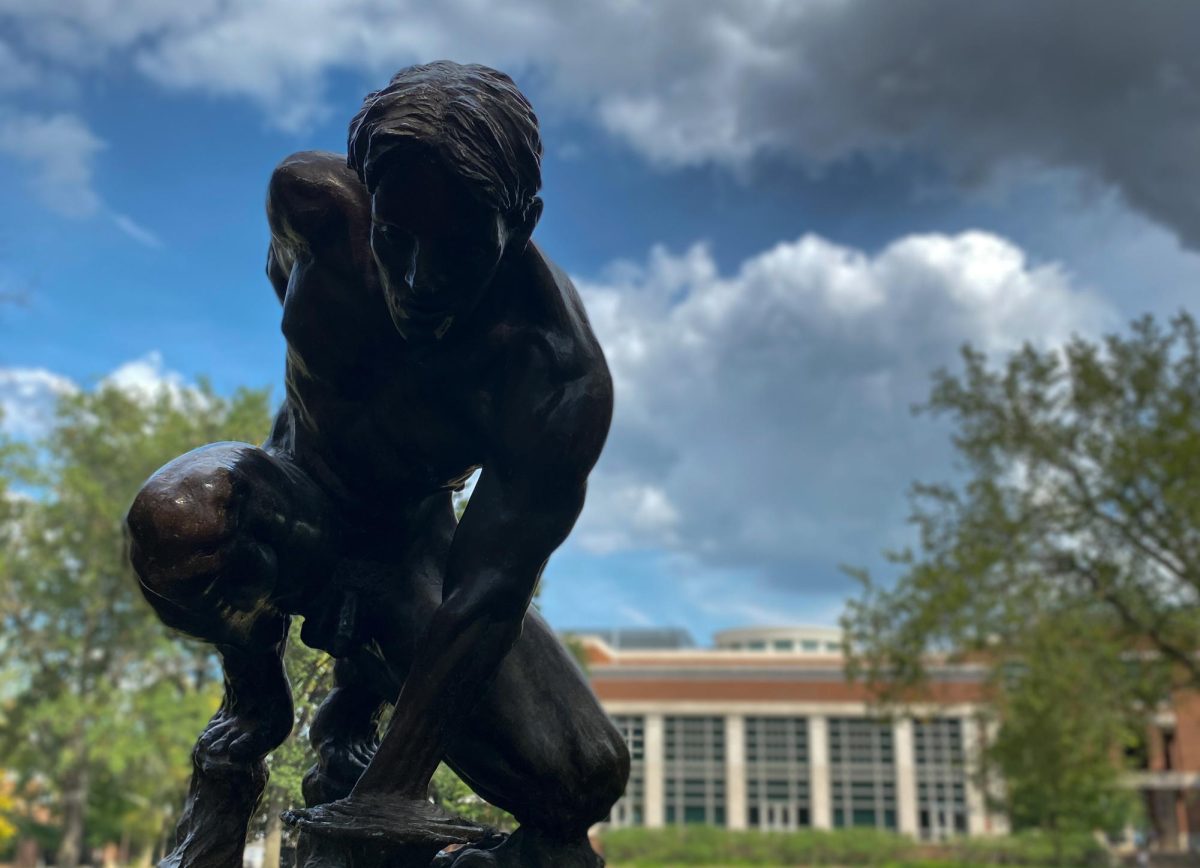 Statue of a man with Commons Center in the background, as photographed on Sept. 8, 2023. (Hustler Multimedia/ George Albu)